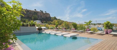 Outdoor pool, pool umbrellas, pool loungers