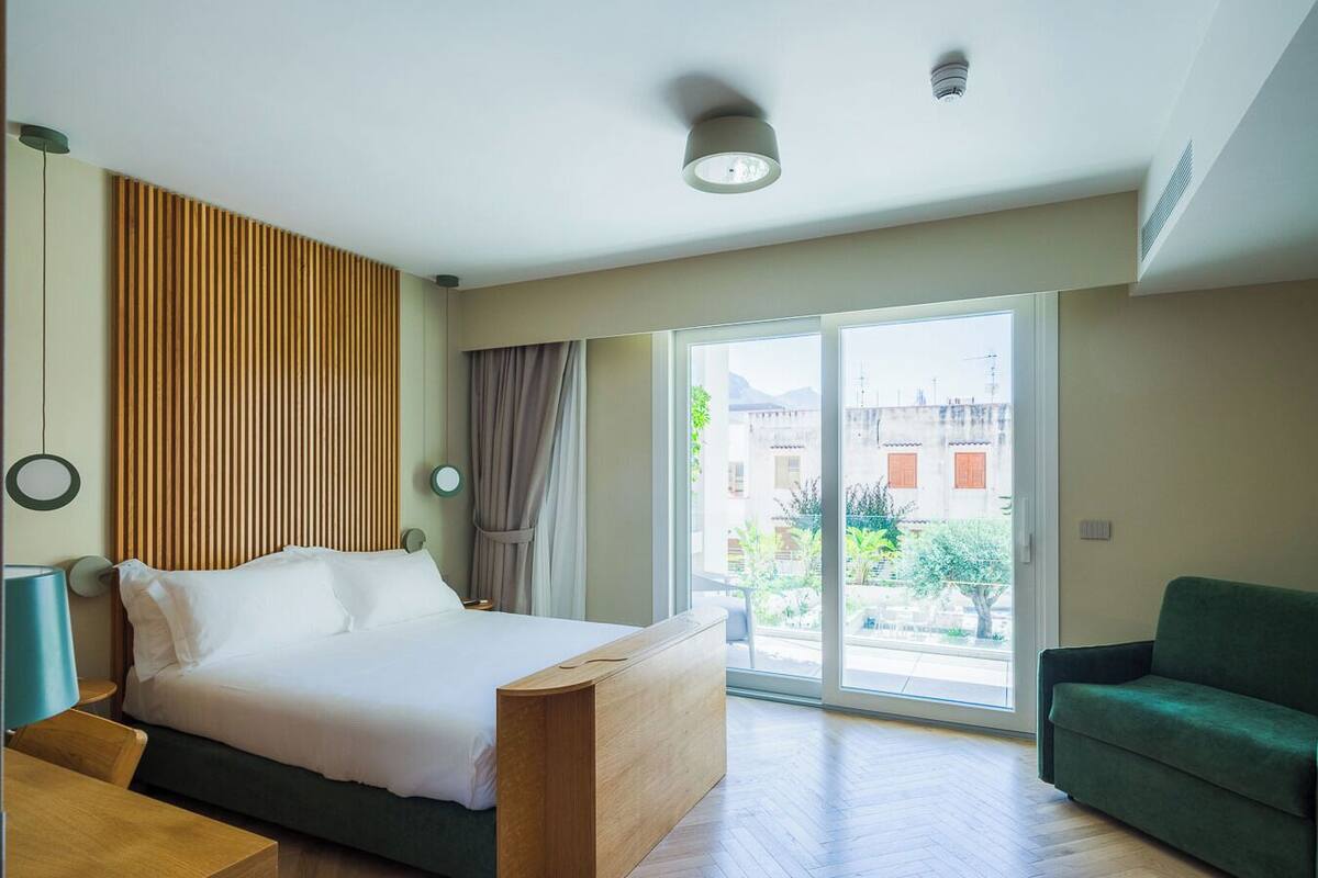 Premium bedding, down duvets, in-room safe, desk