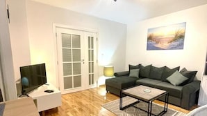 Leilighet, 1 soverom, balkong, byutsikt | Oppholdsområde