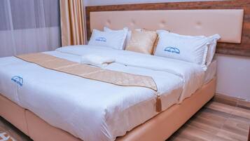 2 dormitorios, tabla de planchar con plancha, wifi y ropa de cama