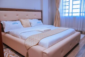 2 dormitorios, tabla de planchar con plancha, wifi y ropa de cama