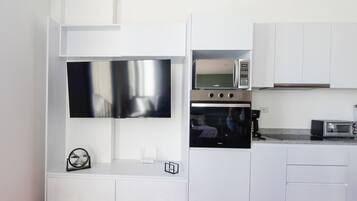 Fridge, microwave, coffee/tea maker, toaster