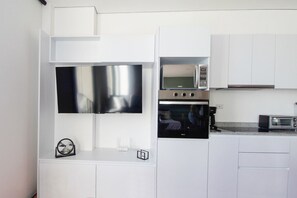 Fridge, microwave, coffee/tea maker, toaster