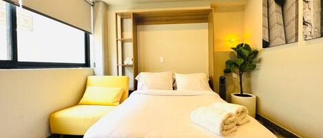 1 slaapkamer, een strijkplank/strijkijzer, wifi