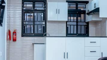 Deluxe Apartment, Balcony, City View | Living area | Smart TV, printers