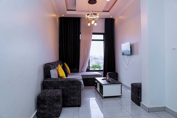 Apartment, Balcony, City View | Living area | Smart TV, printers - Martin Aviator Apartment (Kigali)