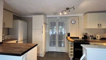 Classic Apartment, 1 Double Bed with Sofa bed | Private kitchen | Electric kettle, toaster, dining tables