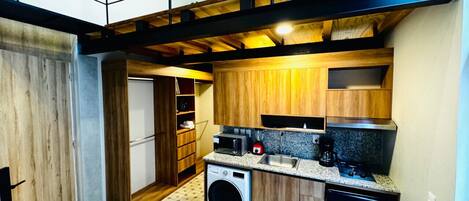 Microwave, coffee/tea maker, cookware/dishes/utensils