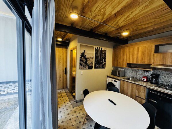 Microwave, stovetop, coffee/tea maker, cookware/dishes/utensils