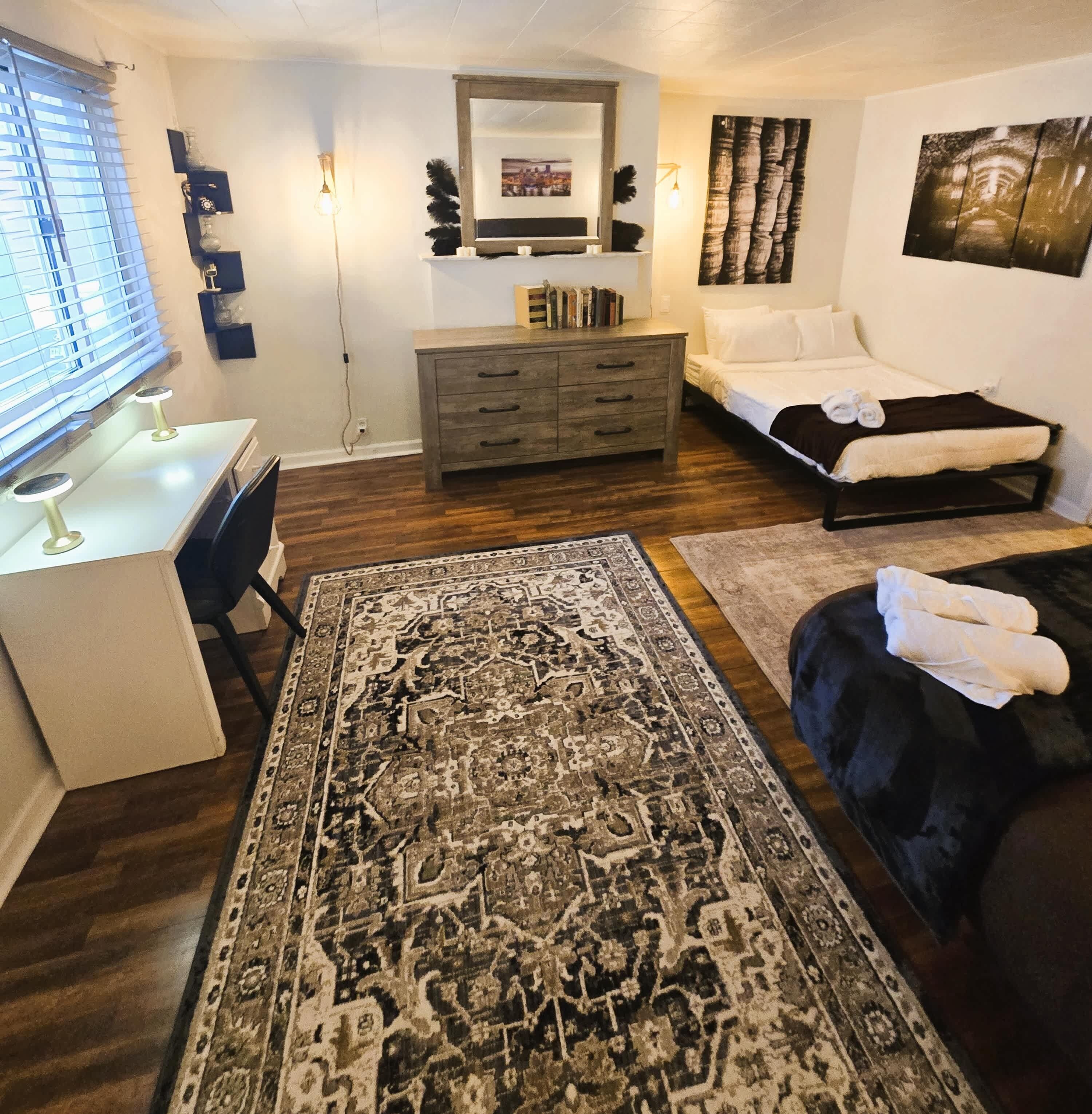 1 bedroom, desk, iron/ironing board, travel crib