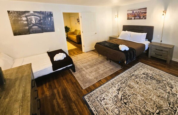 1 bedroom, desk, iron/ironing board, travel cot