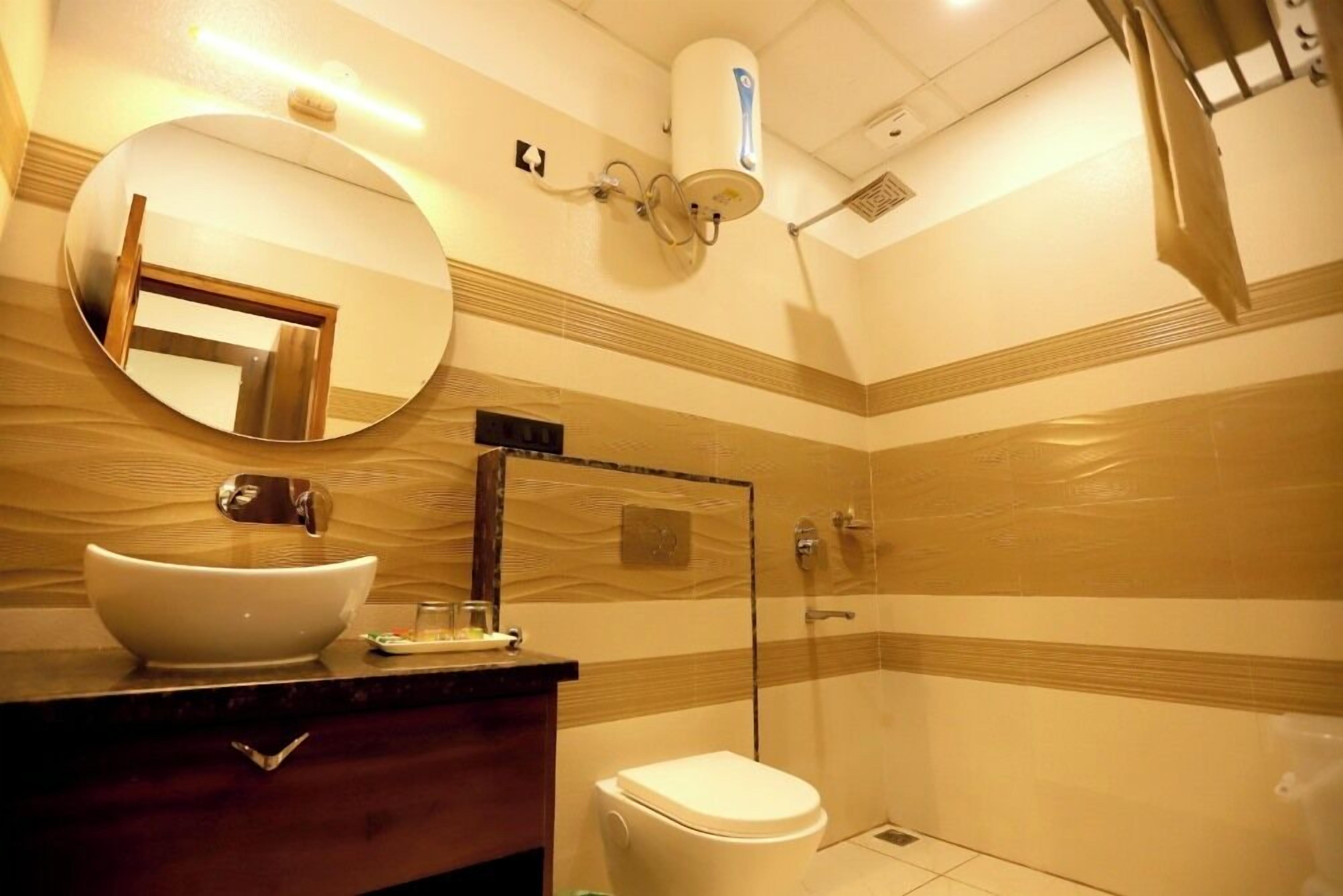 Shower, free toiletries, slippers, towels