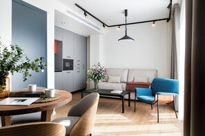 Penthouse, Whirlpool | Wohnbereich | Flachbildfernseher