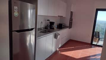 Fridge, microwave, coffee/tea maker, toaster