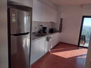 Fridge, microwave, coffee/tea maker, toaster