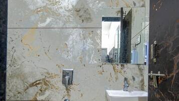 Shower, towels, soap, shampoo