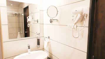 Deluxe Double Room, City View | Bathroom | Shower, hair dryer, slippers, towels