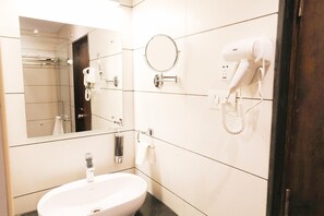 Deluxe Double Room, City View | Bathroom | Shower, hair dryer, slippers, towels