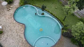 Outdoor pool, open 8:00 AM to 6:00 PM, pool umbrellas, pool loungers