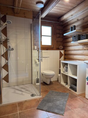 Shower, hair dryer, towels, soap