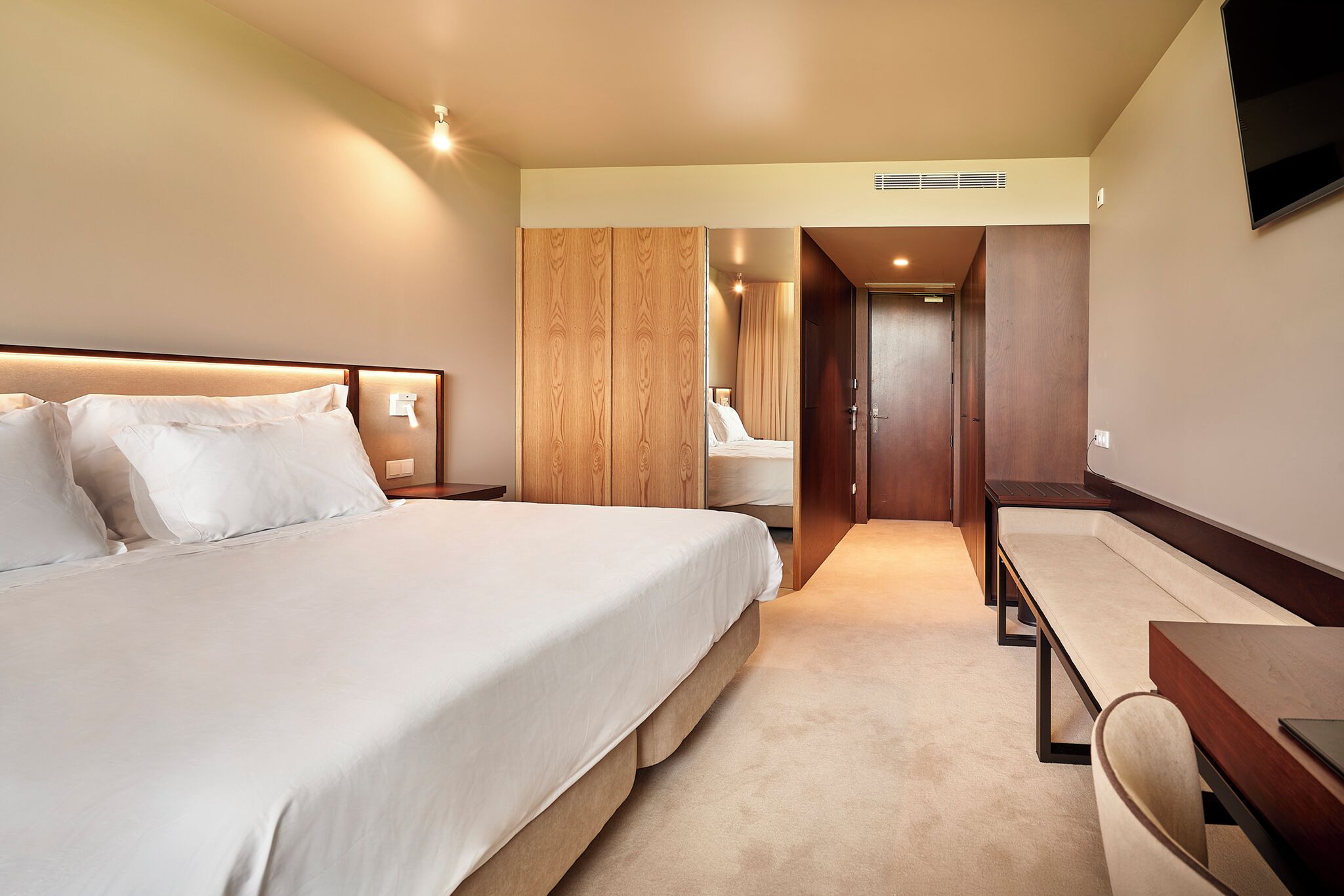 Premium bedding, down duvets, memory-foam beds, minibar