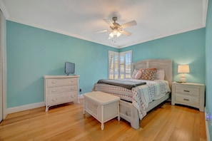 Drift off to sleep in this serene coastal-inspired bedroom, where soothing aqua walls and crisp white furnishings create your peaceful retreat. Gentle ceiling fan breezes keep you comfortable year-round. - BBQ & Pool Day! Large 4B 12 minutes to the Beach! (Largo)