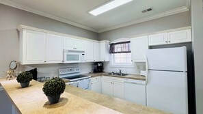 Fridge, microwave, oven, stovetop - Memorable stay at cozy 2BR condo in Magnolia (Myrtle Beach)