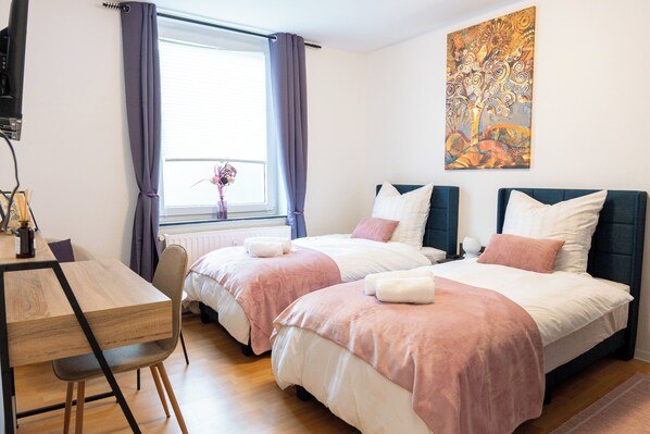 2 bedrooms, desk, iron/ironing board, travel crib