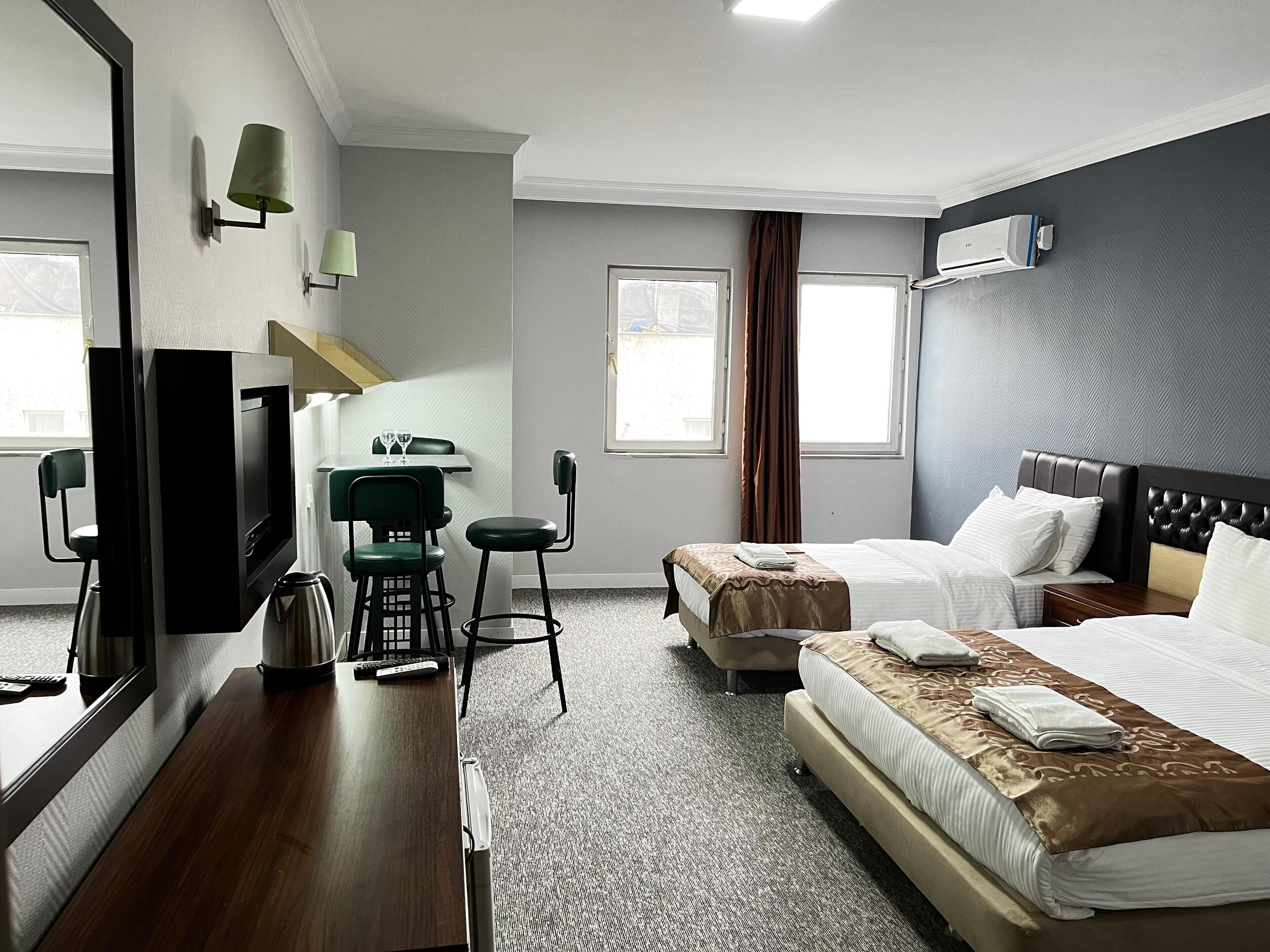 Habitación superior | Sábanas de algodón egipcio, ropa de cama de alta calidad y minibar 