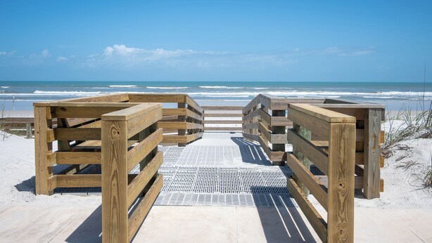 A wooden boardwalk leading to the beach with a clear view of the ocean. - Beachfront Escape with Pool +Ocean & coastal Views (Saint Augustine)
