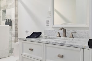 Shower, towels, soap, shampoo