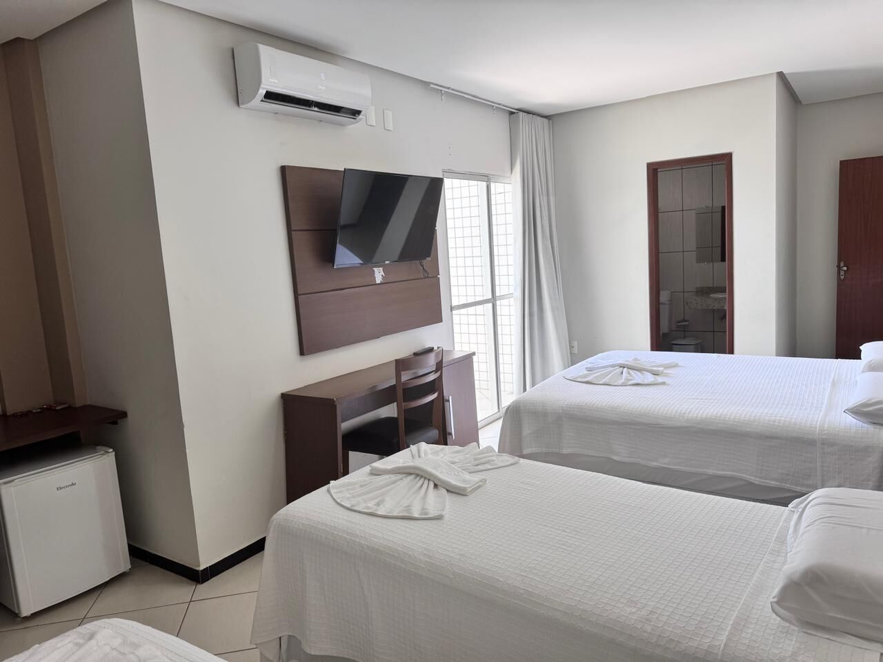 Comfort Quadruple Room | Premium bedding, pillowtop beds, desk, free WiFi