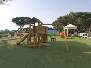 Children's play area - outdoor - Happy Camp in Camping S'Ena Arrubia (Arborea)