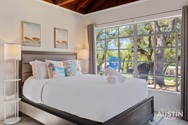 Windows so big, even your naps get a view. Dream with a scenic backdrop and serious fluff!