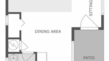 A floor plan with a bedroom, dining area, kitchen, bathroom, sitting area, and patio.