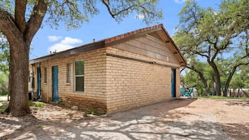 Situated in a serene natural setting, this charming building offers a peaceful retreat.