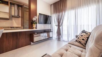 Apartamento | Área de estar | TV