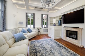 TV, fireplace - Luxurious 8,000 sq ft Private Villa in Budapest – Exclusive Retreat (Budapest)