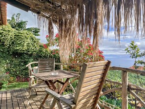 Outdoor dining - Cottage Levada, rural retreat with ocean view (Arco da Calheta)