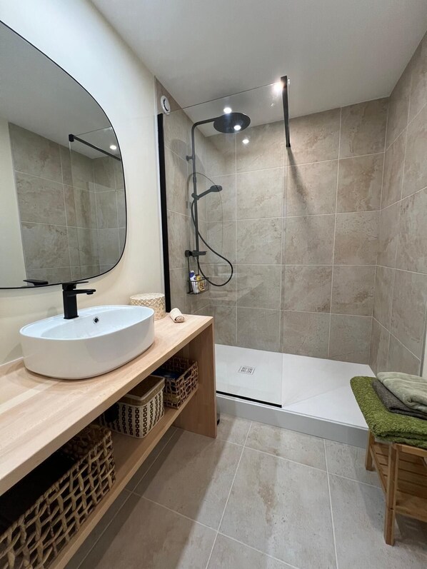 Shower, hair dryer, towels, soap