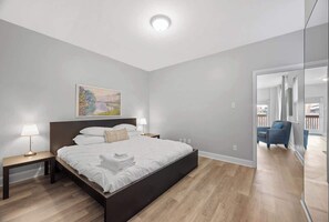 1 bedroom, desk, iron/ironing board, travel cot