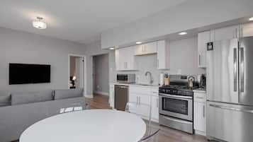 Coffee/tea maker, fridge, microwave, oven