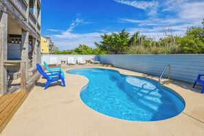 حمّام سباحة خارجي، حمّام سباحة مُدفَّأ