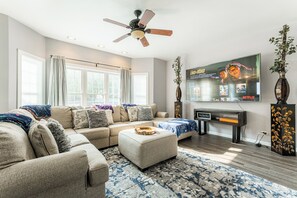 Smart TV, fireplace, ping pong, books