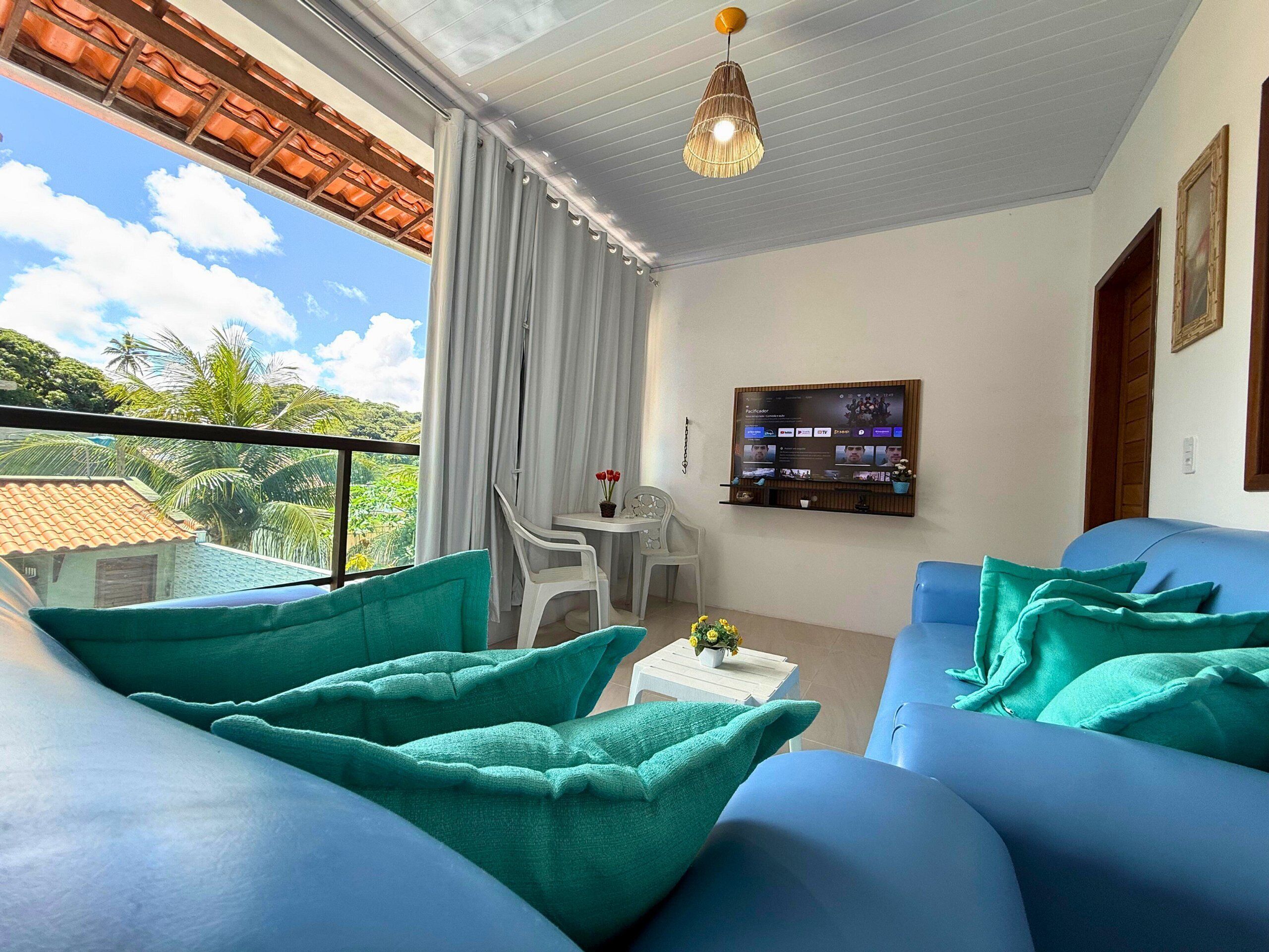 Villa | Living area | 32-inch flat-screen TV with digital channels, TV