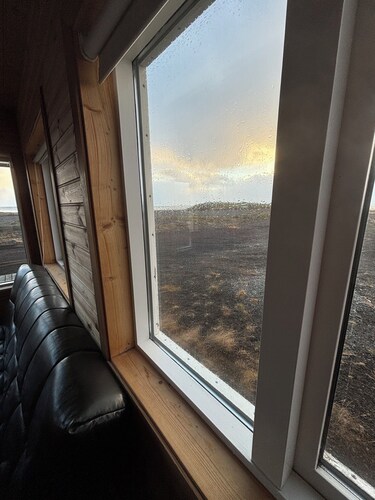Black sand beachfront cabin with private hot tub