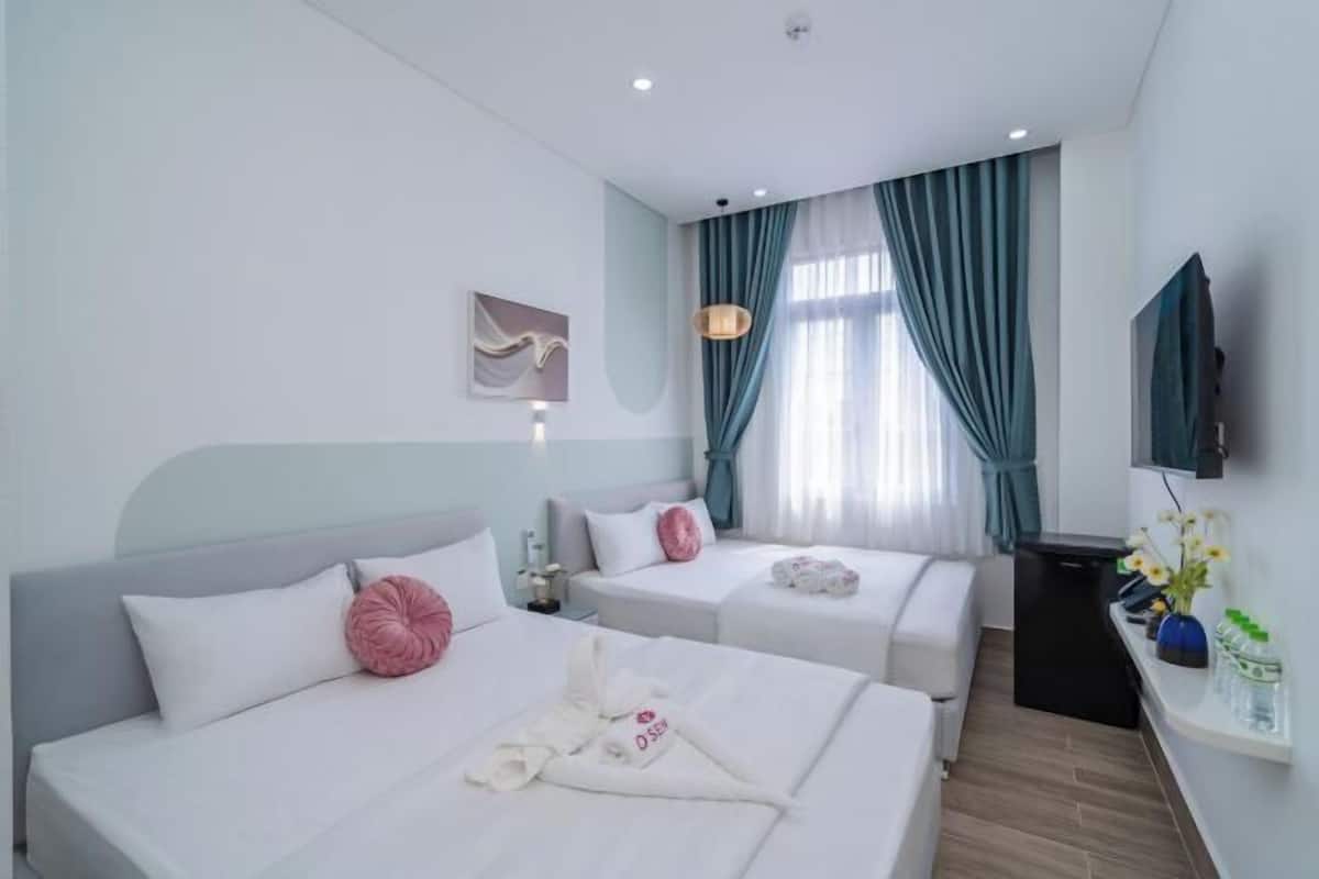 Luxe beddengoed, pillowtop-bedden, een minibar met enkele gratis items