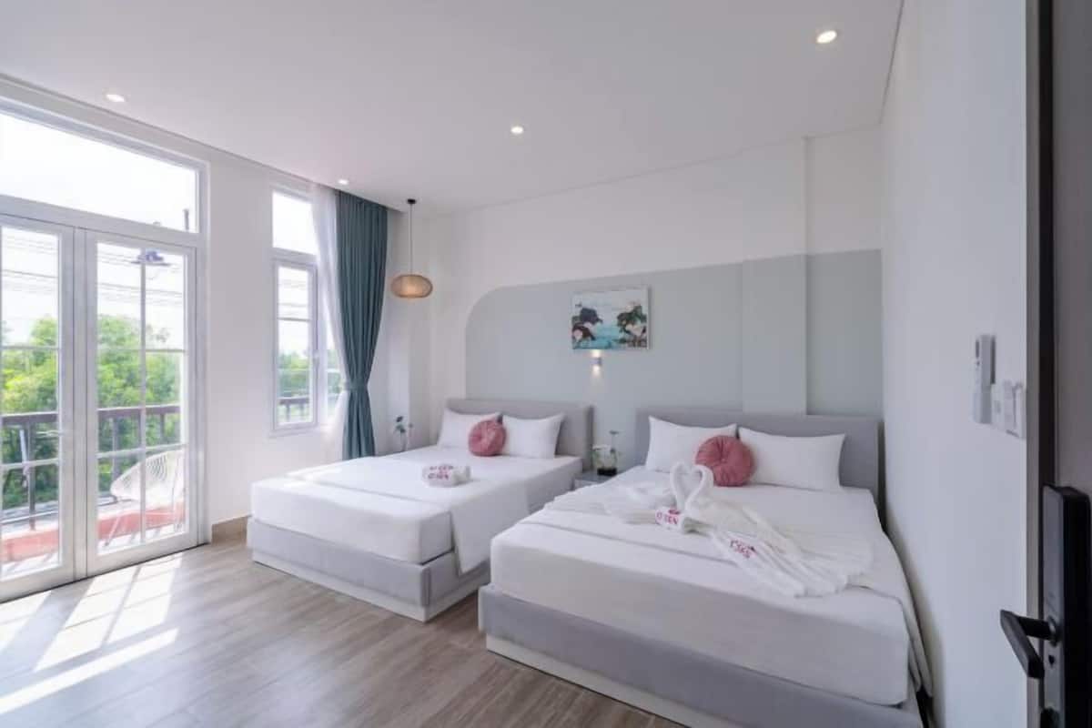 Luxe beddengoed, pillowtop-bedden, een minibar met enkele gratis items