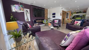 Ferienhaus | Wohnbereich | Fernseher