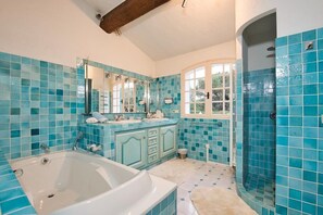Shower, hair dryer, towels, soap